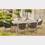 6 seater Aruba dining set on a gravel floor in the garden