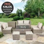 Palma compact garden lounge set in oyster with fire pit table on a stone patio in the garden