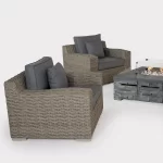 Close up of Palma luxe lounge chairs in rattan with kalos gas stone firepit