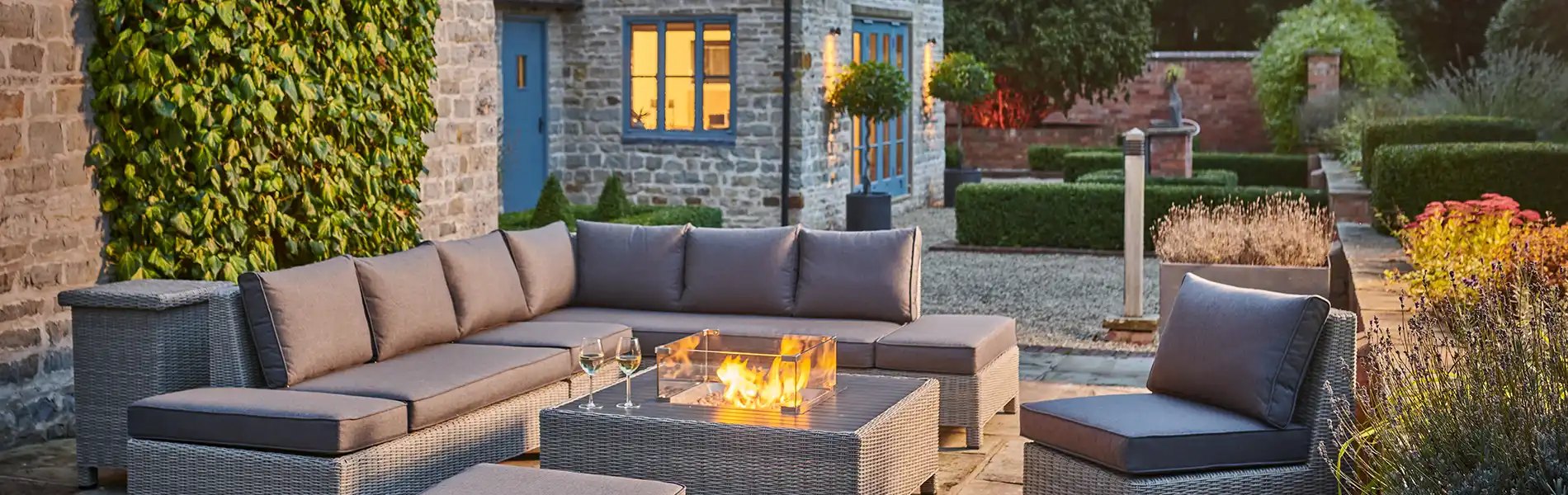 Kettler Palma garden furniture and fire pit on patio