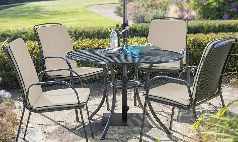 Kettler Savita 4 seat mesh dining set in a beautiful sunny garden