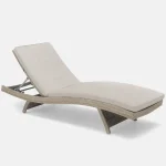 Universal Lounger in oyster with stone cushions on a white background