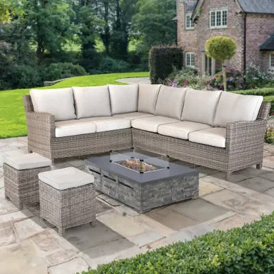 Palma Corner Set with stone fire pit table on a traditional patio garden