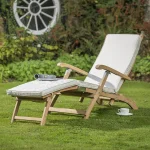 RHS Celsea Steamer lounge chair on a grass garden