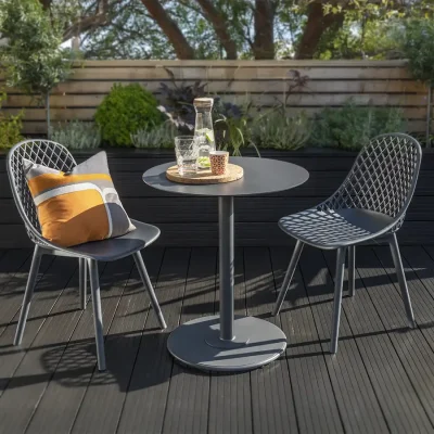 Café Milano bistro set on a decking the a sunny garden