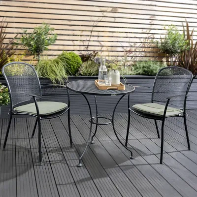 caredo 2 seat bistro set with sage cushions in the garden